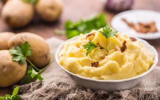 Patate schiacciate al forno